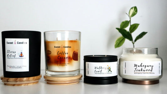 Four Sweet U Candles soy candles lined up together — Stress Relief, Coffee Cacao, Walking Trail, and Mahogany Teakwood — showing a range of scents for a seasonal candle rotation